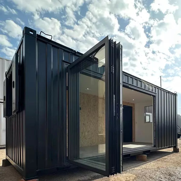 CONTENEDOR DE OFICINA 6,4 X 2,4 M CON PUERTA PLEGABLE